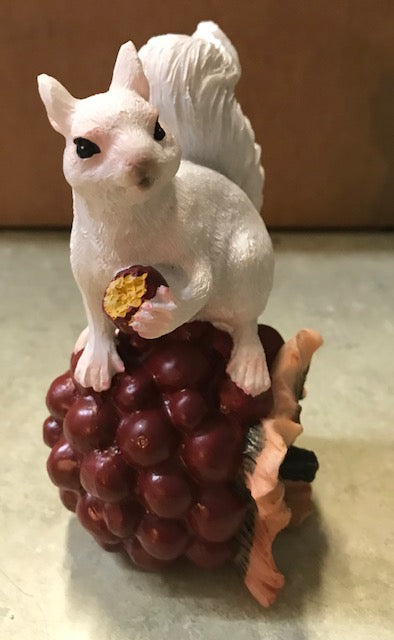 Figurine - Resin - White Squirrel Perched on a Pomegranate